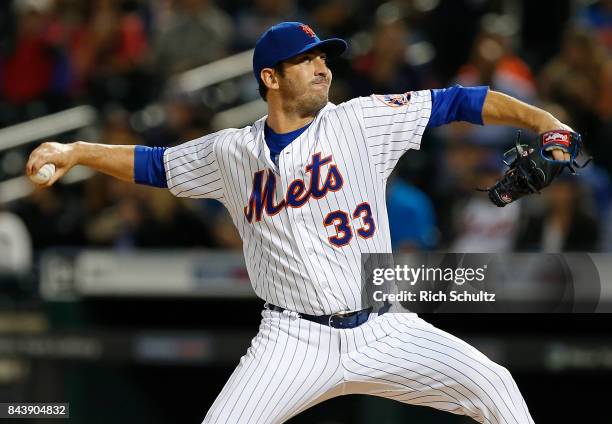 Pitcher Matt Harvey of the New York Mets delivers a pitch against the Cincinnati Reds during the second inning of a game at Citi Field on September...