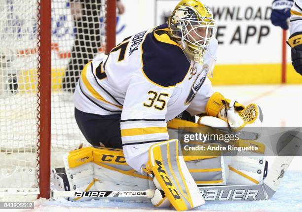 Goaltender Anders Lindback of the Buffalo Sabres plays in the game against the Toronto Maple Leafs at the Air Canada Center on March 11, 2015 in...