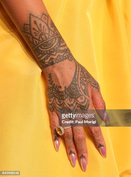 Rihanna, tattoo and jewelry detail, at the Fenty by Rihanna Launch at the Duggal Greenhouse on September 7, 2017 in New York City.