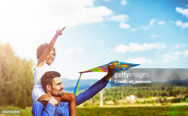 kite ready for fly off - human joint stock pictures, royalty-free photos & images