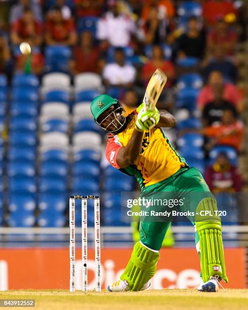 In this handout image provided by CPL T20, Roshan Primus of Guyana Amazon Warriors hits 6 during Eliminator 2 of the 2017 Hero Caribbean Premier...