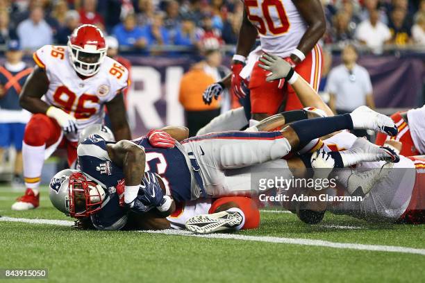 Mike Gillislee of the New England Patriots scores a touchdown during the second quarter against the Kansas City Chiefs at Gillette Stadium on...