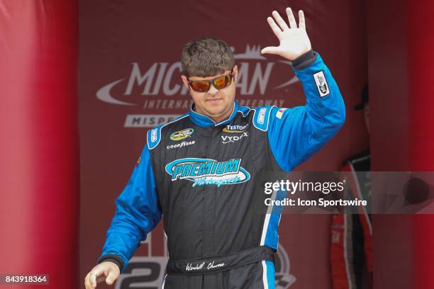 Wendell Chavous , driver of the JAS Expedited Trucking, LLC Chevrolet, greets fans during the pre-race ceremonies of the Camping World Truck Series...