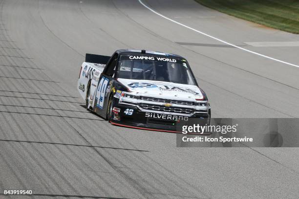 Wendell Chavous , driver of the JAS Expedited Trucking, LLC Chevrolet, races during the Camping World Truck Series LTi Printing 200 race on August...