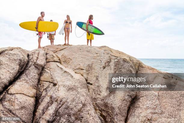 group of surfers on hainan island - hainan island bildbanksfoton och bilder