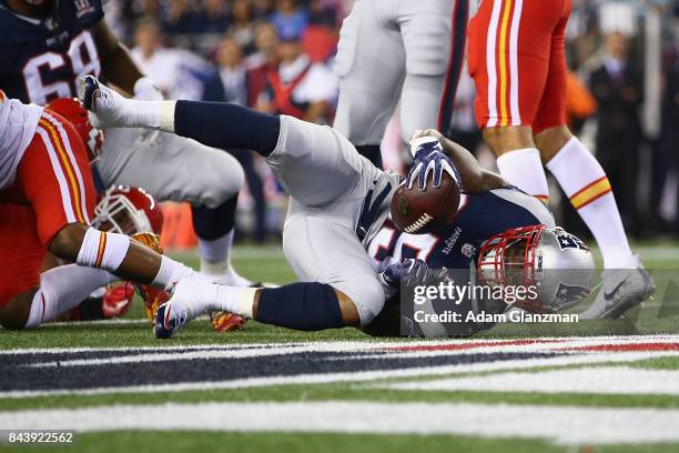 Mike Gillislee of the New England Patriots scores a touchdown during the first quarter against the Kansas City Chiefs at Gillette Stadium on...