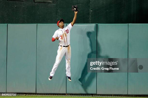 Michael Taylor of the Washington Nationals catches a fly ball hit by Andres Blanco of the Philadelphia Phillies in the seventh inning at Nationals...