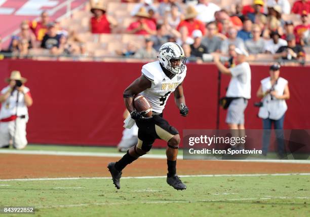 Western Michigan Broncos quarterback Chris Riddle runs the ball back during the game against the Western Michigan Broncos on September 02 at the Los...