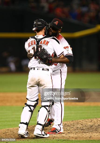 Arizona Diamondbacks Pitcher Fernando Rodney and Arizona Diamondbacks Catcher Chris Herrmann celebrate during the MLB baseball game between the Los...