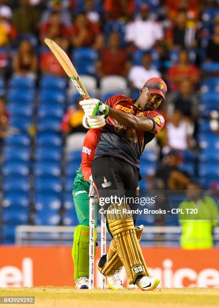 In this handout image provided by CPL T20, Darren Bravo of Trinbago Knight Riders hits 6 during Eliminator 2 of the 2017 Hero Caribbean Premier...