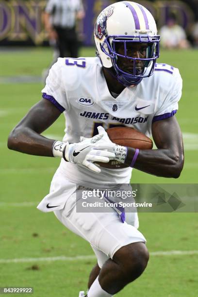 Wide receiver Ishmael Hyman of the James Madison Dukes catches a pass during a game between the James Madison Dukes and the East Carolina Pirates on...