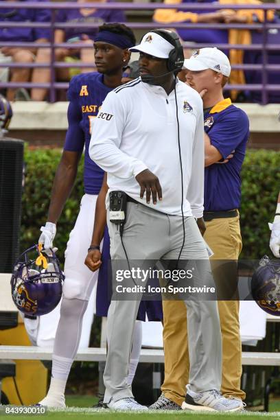 East Carolina Pirates head coach Scottie Montgomery paces the sidelines during a game between the James Madison Dukes and the East Carolina Pirates...