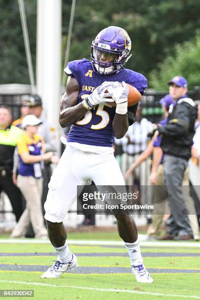 Defensive back Chris Love of the East Carolina Pirates fields a punt during a game between the James Madison Dukes and the East Carolina Pirates on...