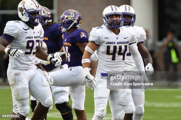 Safety Jordan Brown of the James Madison Dukes celebrates after intercepting a pass during a game between the James Madison Dukes and the East...