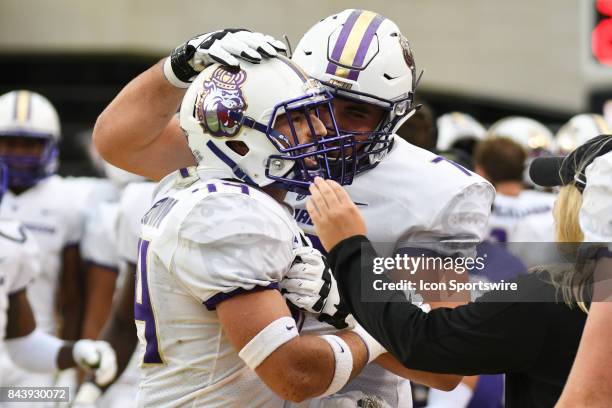 Safety Jordan Brown of the James Madison Dukes celebrates after intercepting a pass during a game between the James Madison Dukes and the East...
