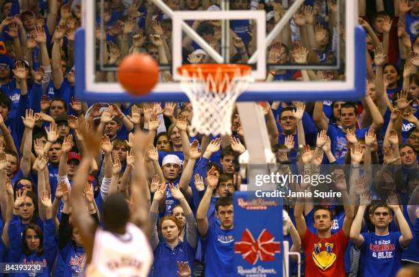 Fans of the Kansas State Wildcats try to distract a free-throw by a the Kansas Jayhawks player during the game on January 13, 2009 at Allen...
