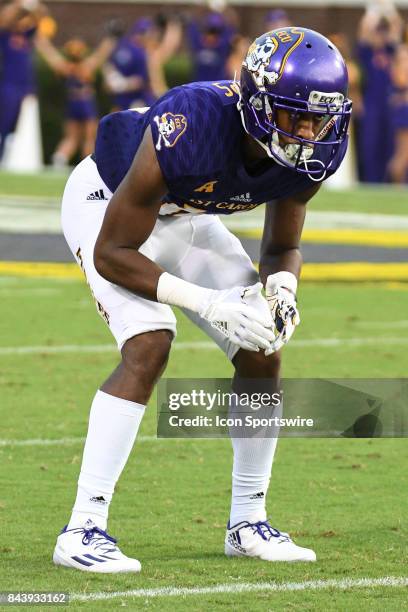 Defensive back Travis Phillips of the East Carolina Pirates lines up before a play during a game between the James Madison Dukes and the East...