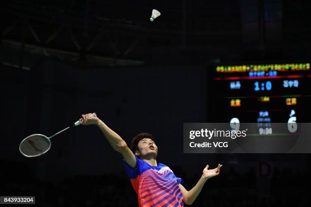 Shi Yuqi competes during the Men's singles badminton final match against Lin Dan on day twelve of the 13th Chinese National Games on September 8,...