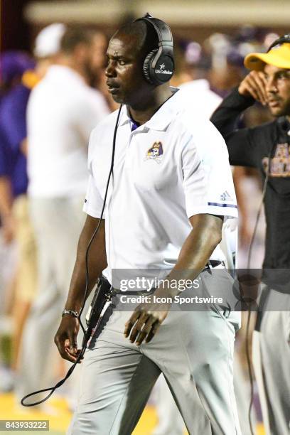 East Carolina Pirates defensive coordinator Kenwick Thompson paces the sidelines during a game between the James Madison Dukes and the East Carolina...