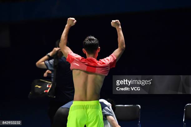 Lin Dan celebrates after winning the Men's singles badminton final match against Shi Yuqi on day twelve of the 13th Chinese National Games on...