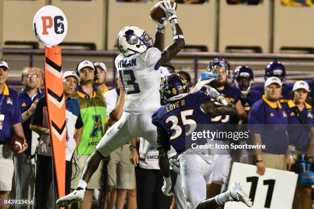 Wide receiver Ishmael Hyman of the James Madison Dukes catches a pass during a game between the James Madison Dukes and the East Carolina Pirates on...
