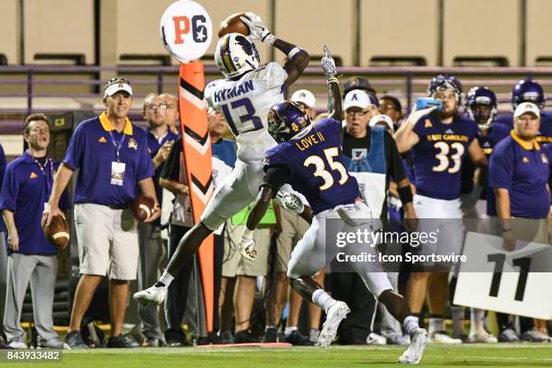 Wide receiver Ishmael Hyman of the James Madison Dukes catches a pass during a game between the James Madison Dukes and the East Carolina Pirates on...