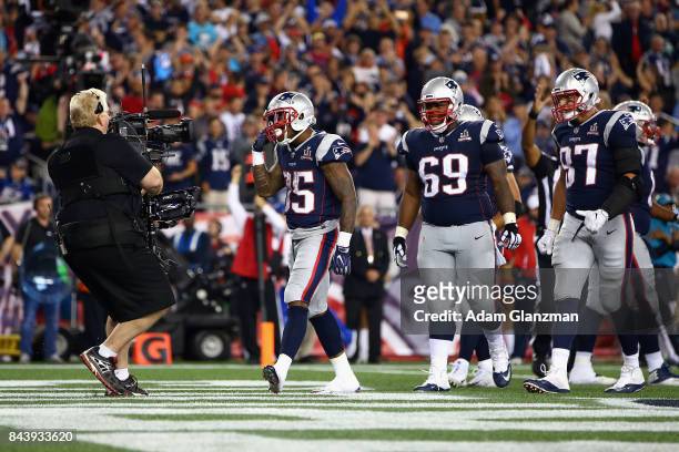Mike Gillislee of the New England Patriots celebrates after scoring a 1-yard touchdown during the third quarter against the Kansas City Chiefs at...