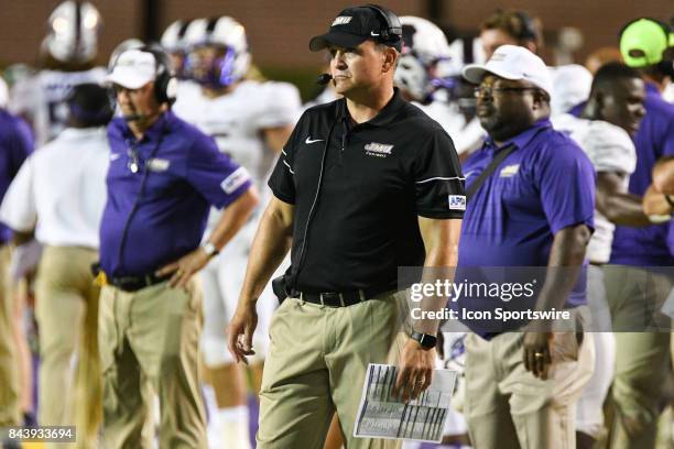 James Madison Dukes head coach watches a play during a game between the James Madison Dukes and the East Carolina Pirates on September 2, 2017 at...