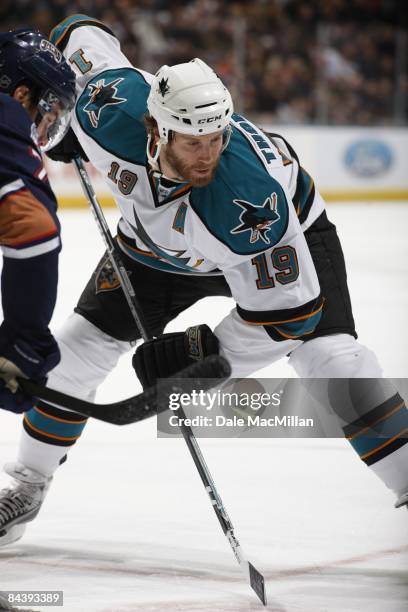 Joe Thornton of the San Jose Sharks faces off against the Edmonton Oilers on January 9, 2009 at Rexall Place in Edmonton, Alberta, Canada.