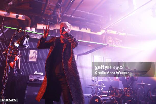 Machine Gun Kelly performs onstage at the John Varvatos x MGK Fashion Week Concert at John Varvatos 315 Bowery Boutique on September 7, 2017 in New...
