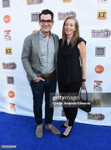 Actor Ty Burrell and Holly Burrell arrive at the Kids In The Spotlight's "Cocktails For A Cause" event at The District Restaurant on September 7,...