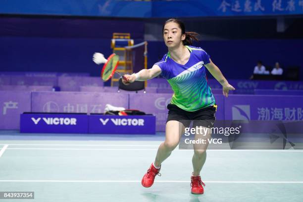 Wang Shixian competes against Chen Yufei during the Women's singles badminton final match during the 13th Chinese National Games on September 7, 2017...