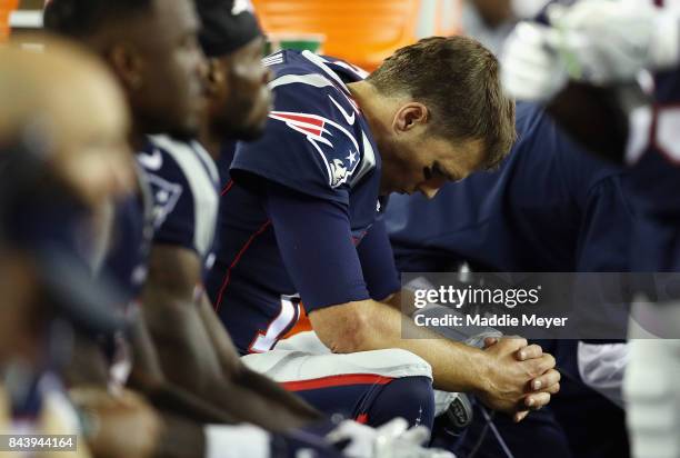 Tom Brady of the New England Patriots reacts on the bench during the second half against the Kansas City Chiefs at Gillette Stadium on September 7,...