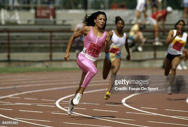 Florence Griffith Joyner competes during the 200m at the 1988 US Track and Field Olympic Trials in Indianapolis, Indiana.