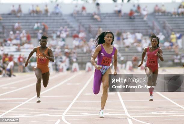 Florence Griffith Joyner competes during the 100m at the 1988 US Track and Field Olympic Trials in Indianapolis, Indiana.