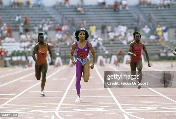 Florence Griffith Joyner competes during the 100m at the 1988 US Track and Field Olympic Trials in Indianapolis, Indiana.