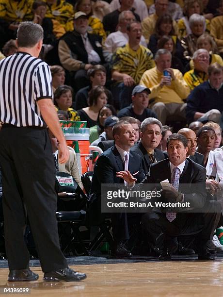 Wake Forest Demon Deacons head coach Dino Gaudio discusses a call with referee Jamie Luckie during the first half against the North Carolina Tar...