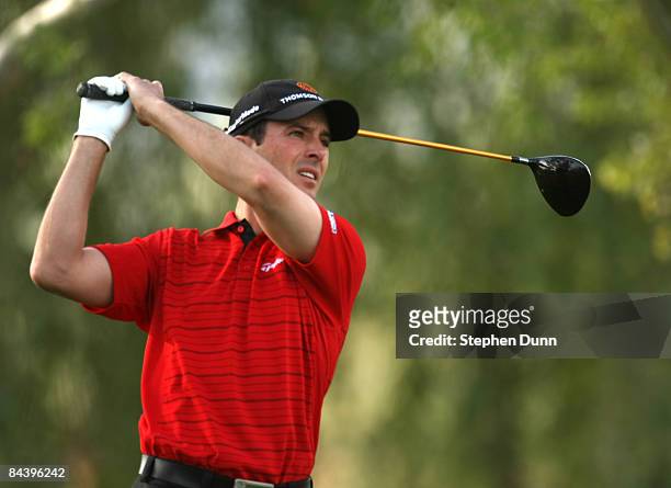 Mike Weir of Canada hits his tee shot on the second hole on the Palmer Private Course at PGA West during the first round of the Bob Hope Chrysler...