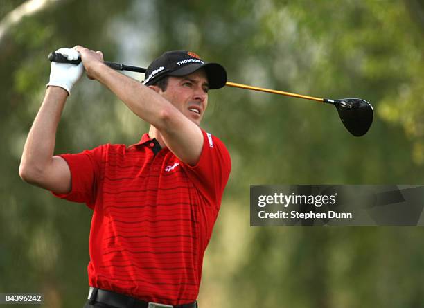 Mike Weir of Canada hits his tee shot on the second hole on the Palmer Private Course at PGA West during the first round of the Bob Hope Chrysler...