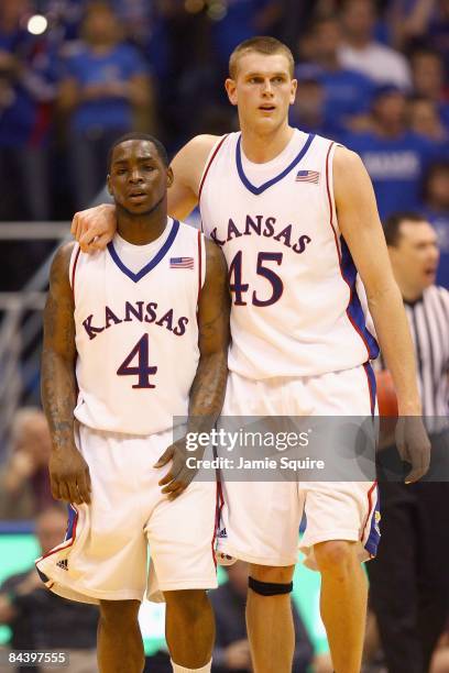 Sherron Collins and Cole Aldrich of the Kansas Jayhawks walk on court against the Tennessee Volunteers on January 3, 2009 at Allen Fieldhouse in...