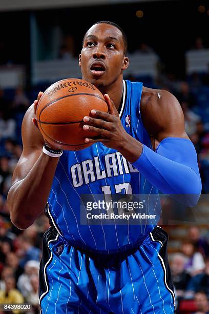 Dwight Howard of the Orlando Magic shoots a free throw during the game against the Sacramento Kings on January 13, 2009 at Arco Arena in Sacramento,...