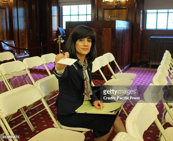 Judge Rachel Freier offers her business card in the ny city...