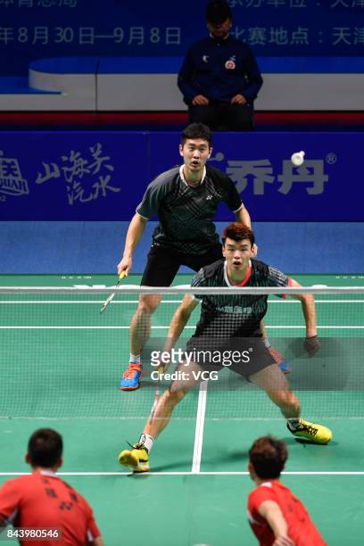 Wang Yiilv and Liu Cheng compete against Hong Wei and Chai Biao during the Men's doubles badminton final match during the 13th Chinese National Games...