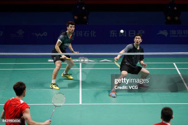 Wang Yiilv and Liu Cheng compete against Hong Wei and Chai Biao during the Men's doubles badminton final match during the 13th Chinese National Games...