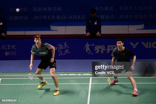 Wang Yiilv and Liu Cheng compete against Hong Wei and Chai Biao during the Men's doubles badminton final match during the 13th Chinese National Games...