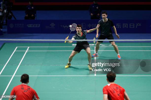 Wang Yiilv and Liu Cheng compete against Hong Wei and Chai Biao during the Men's doubles badminton final match during the 13th Chinese National Games...