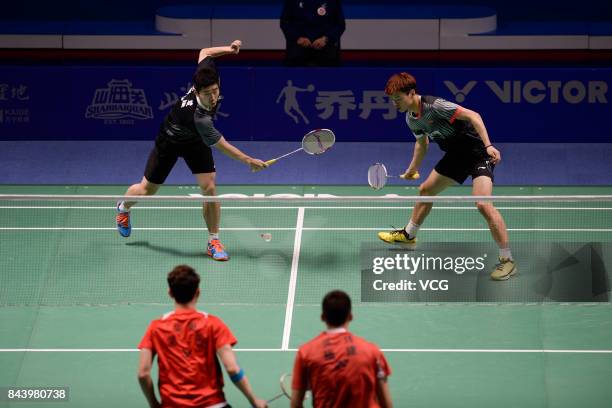 Wang Yiilv and Liu Cheng compete against Hong Wei and Chai Biao during the Men's doubles badminton final match during the 13th Chinese National Games...