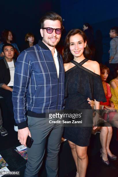 Christian Mongendre and Celina Horan attends Tadashi Shoji show at New York Fashion Week at Gallery 1, Skylight Clarkson Sq on September 7, 2017 in...