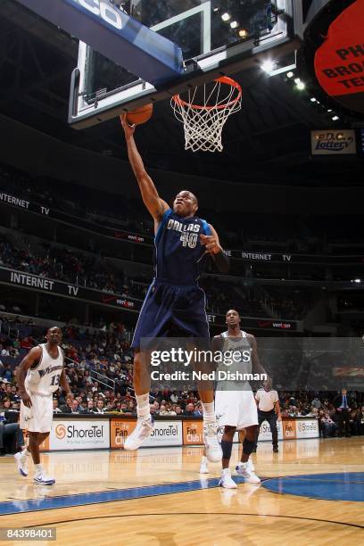 Devean George of the Dallas Mavericks lays up a shot against the Washington Wizards during the game at the Verizon Center on December 21, 2008 in...