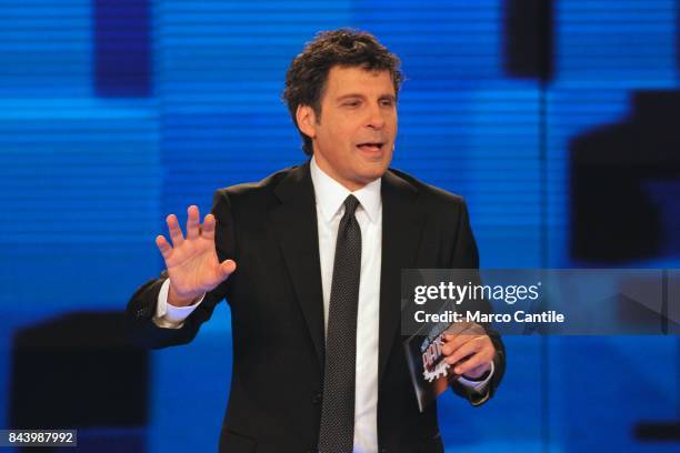 The italian anchor man Fabrizio Frizzi, during the TV show Non Sparate Sul Pianista, in RAI studios.